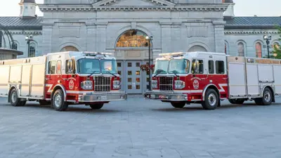 A blurry firetruck rushing to an emergency