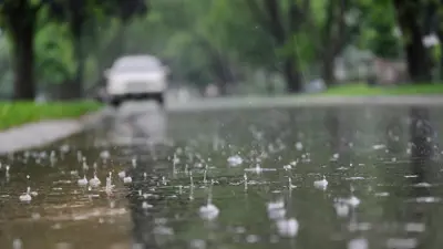 A street covered in rain water