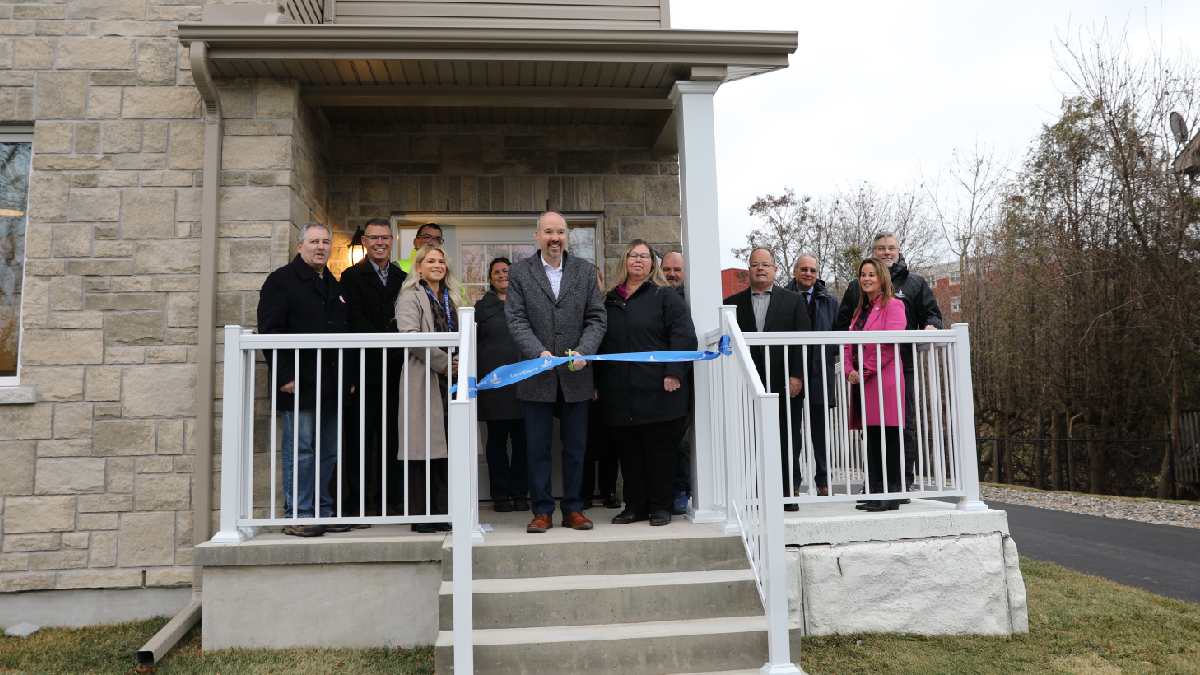 Representatives of the City and community partners cutting ribbon.