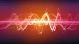 A graphically representation of sound waves on a orange and pink background