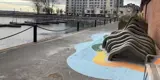 Pathway featuring Water Snake public art installation