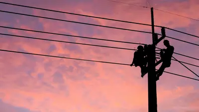 Workers working on a powerline