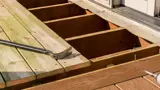 A deck being contructed with tools